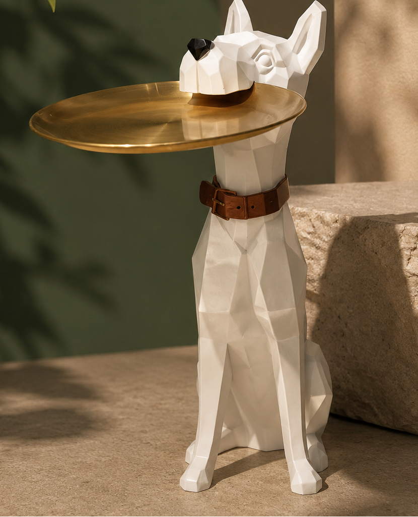 White dog-shaped table with a gold tray on a neutral background