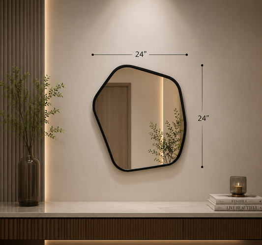 Hexagonal wall mirror with a matte black frame, shown hanging on a beige wall above a console table. The image includes dimension markers showing 24 inches by 24 inches and a specifications panel at the bottom detailing the premium mirror glass, matte black powder-coated finish, and dimensions.