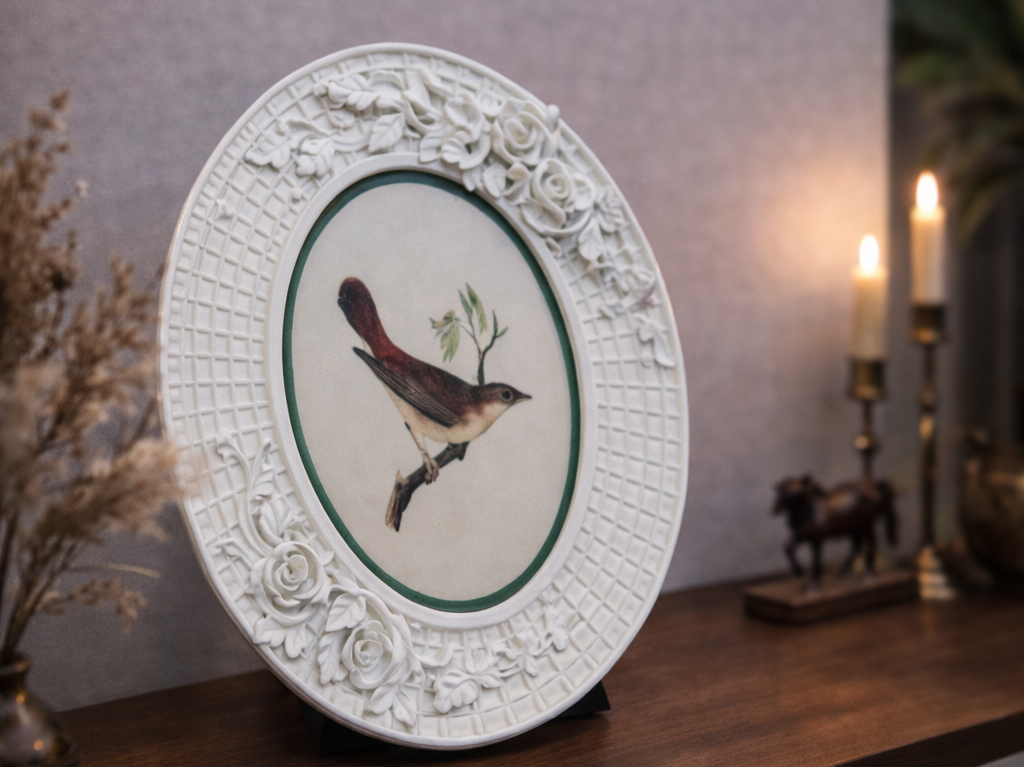 Decorative plate with a bird design on a wooden surface