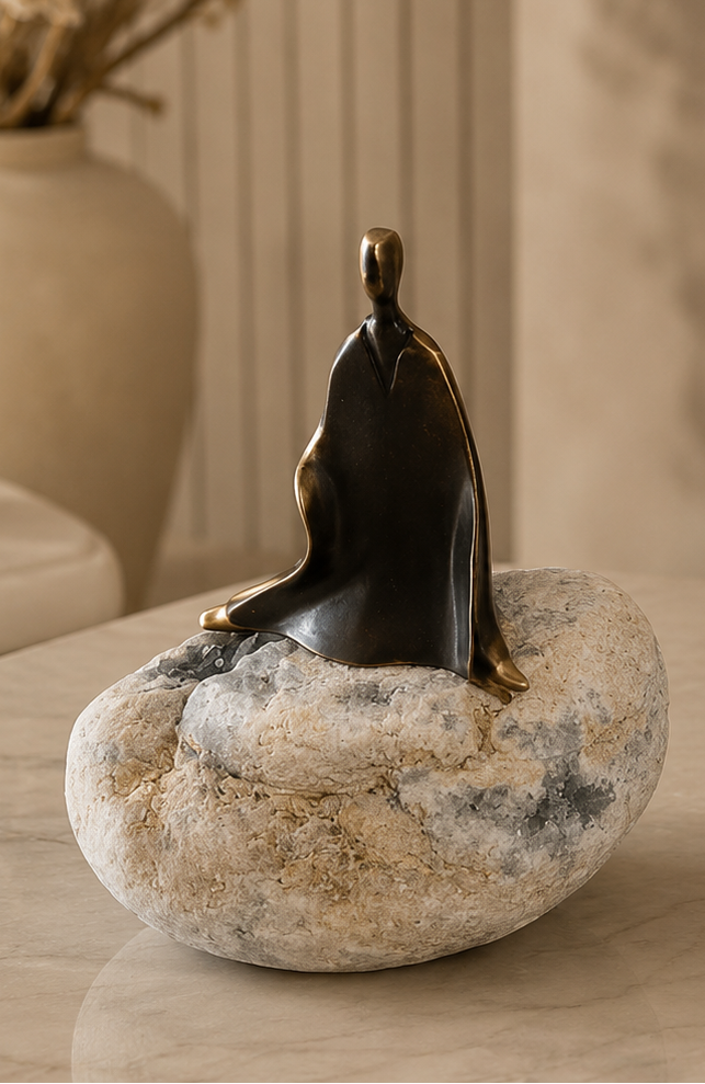 Decorative sculptures on stone bases with a neutral background
