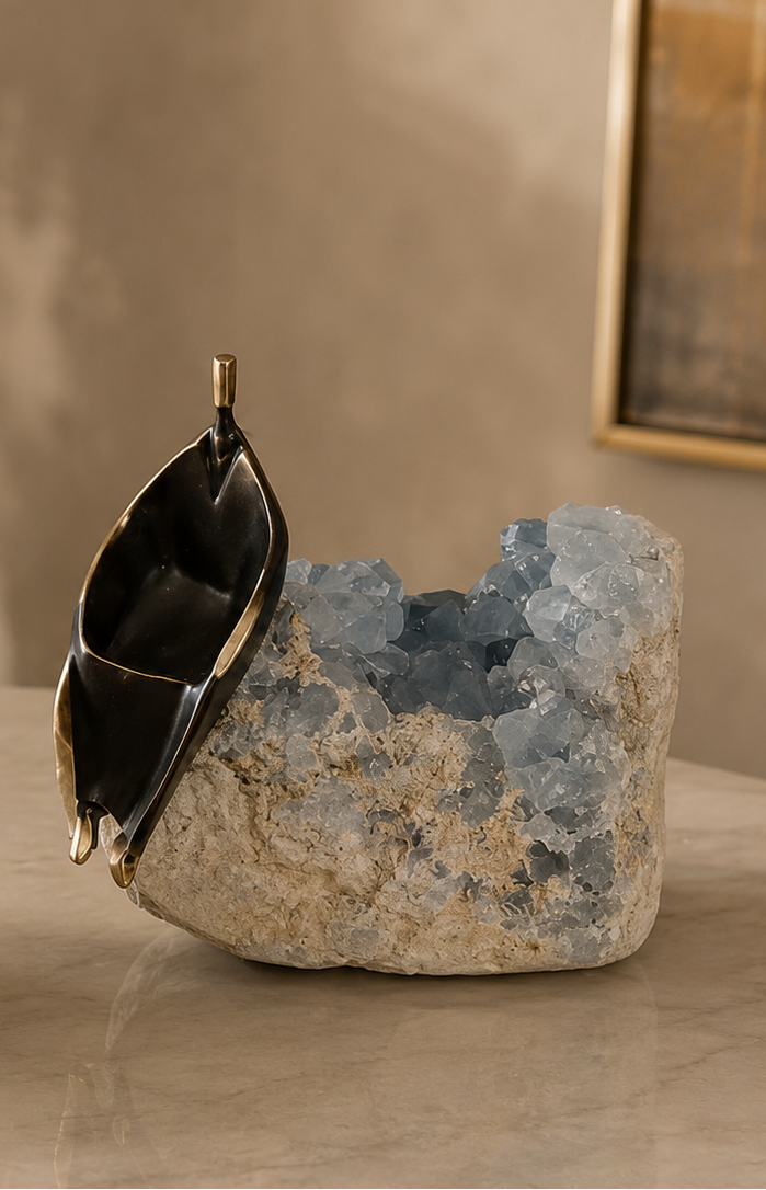Decorative sculptures on stone bases with a neutral background