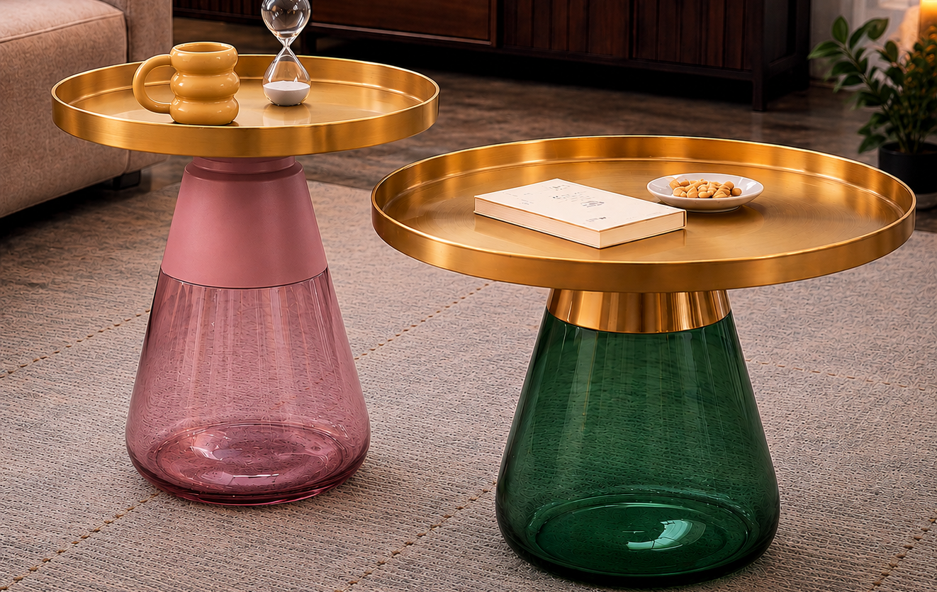 Two stylish side tables with gold and colorful bases in a living room setting.