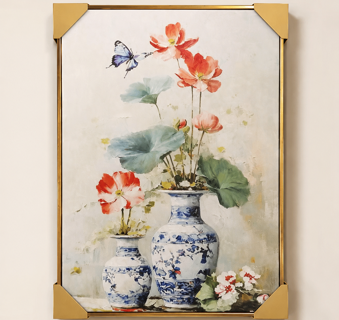 Framed artwork of flowers and vases on a beige wall
