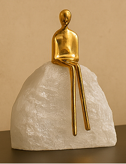 KIVO SEATED FIGURINE SCULPTURE