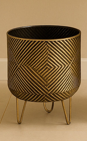 Two decorative pots with geometric patterns on a beige floor and wall.
