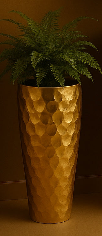 Two gold hammered planters with plants against a brown background