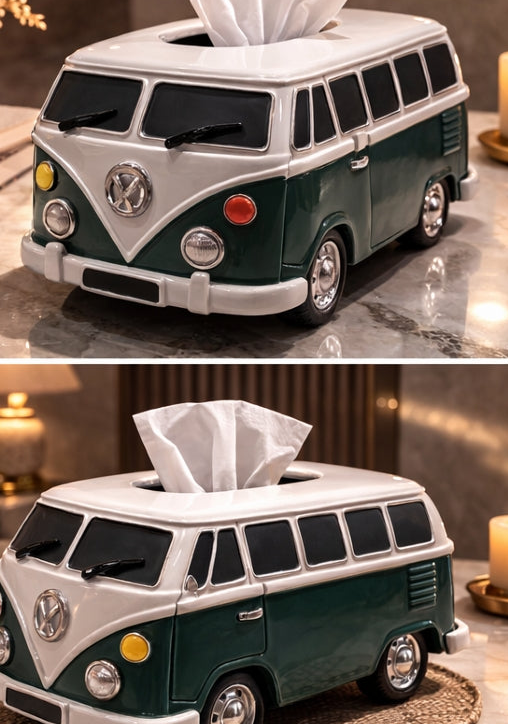 Volkswagen van-shaped tissue box on a marble surface with decorative elements.
