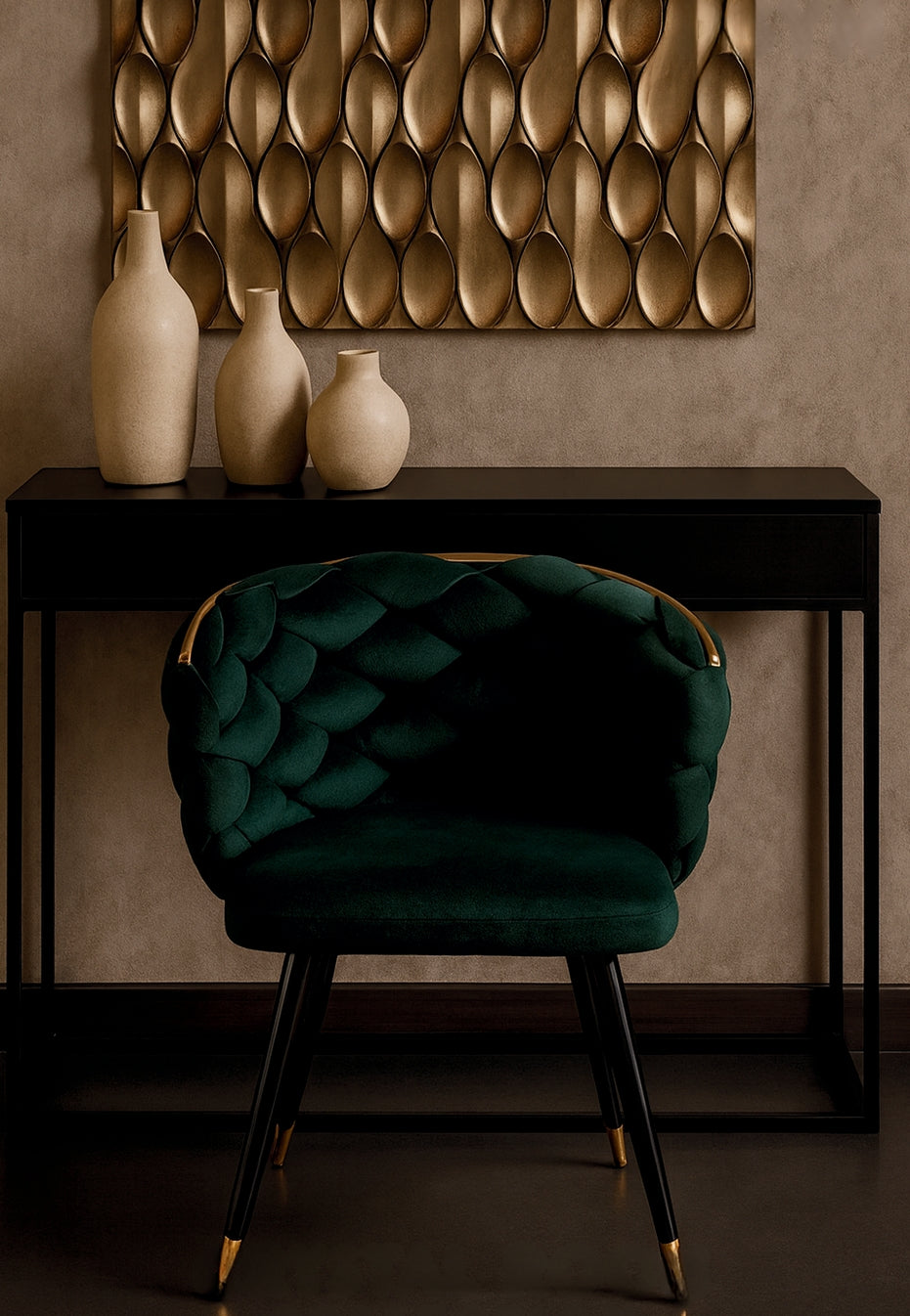 Green cushioned chair in front of a dark console table with decorative vases against a textured wall.