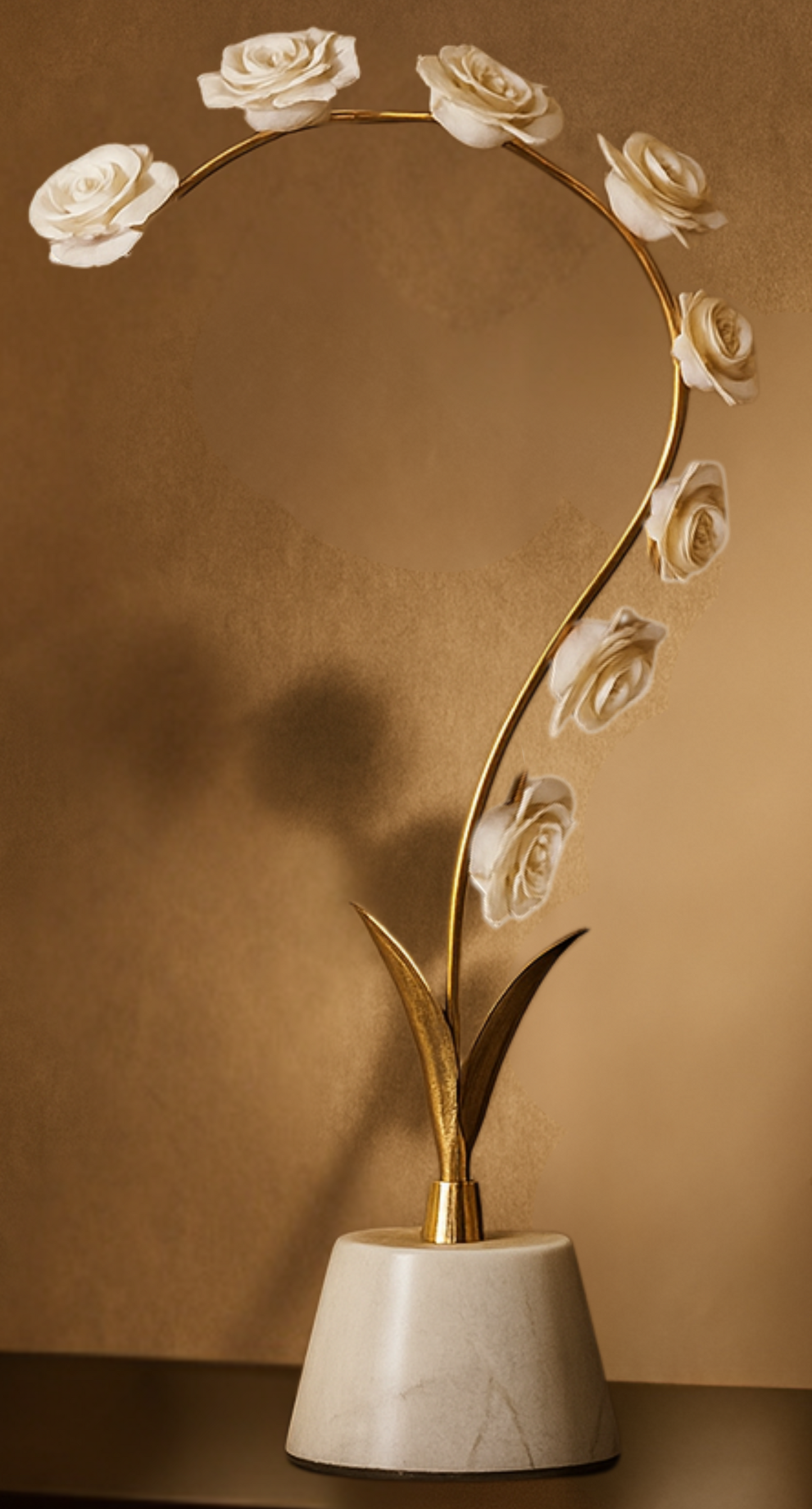 Decorative lamp with floral design on a table against a brown wall